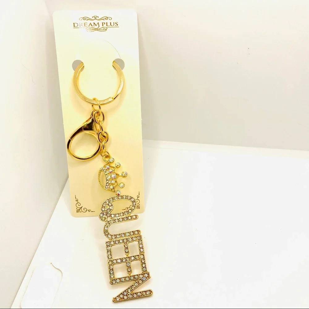 Purse Charm Key Chain Queen Iridescent Crystals set in golden tone. BRAND NEW